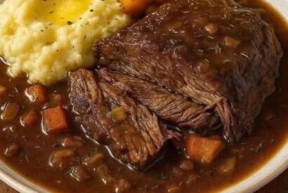 Thumbnail for 🥩 Slow-Cooked Pot Roast with Gravy Over Creamy Mashed Potatoes
