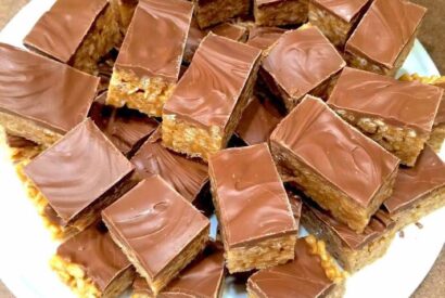 Thumbnail for 🍫🥜 Chewy Snickers Brownies