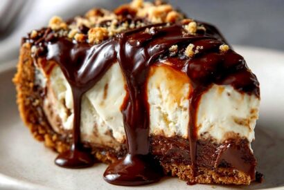 Thumbnail for Crunchy Cookie Crust, Rich Fudge Layer, Double Ice Cream Cake