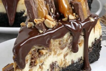 Thumbnail for Peanut Butter Snickers Cheesecake