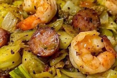 Thumbnail for Fried Cabbage with Shrimp Sausage & Bacon